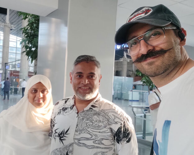 A Sri Lankan couple from Oman with Alireza Damadzadeh the certified tour guide and Travel advisor in Iran